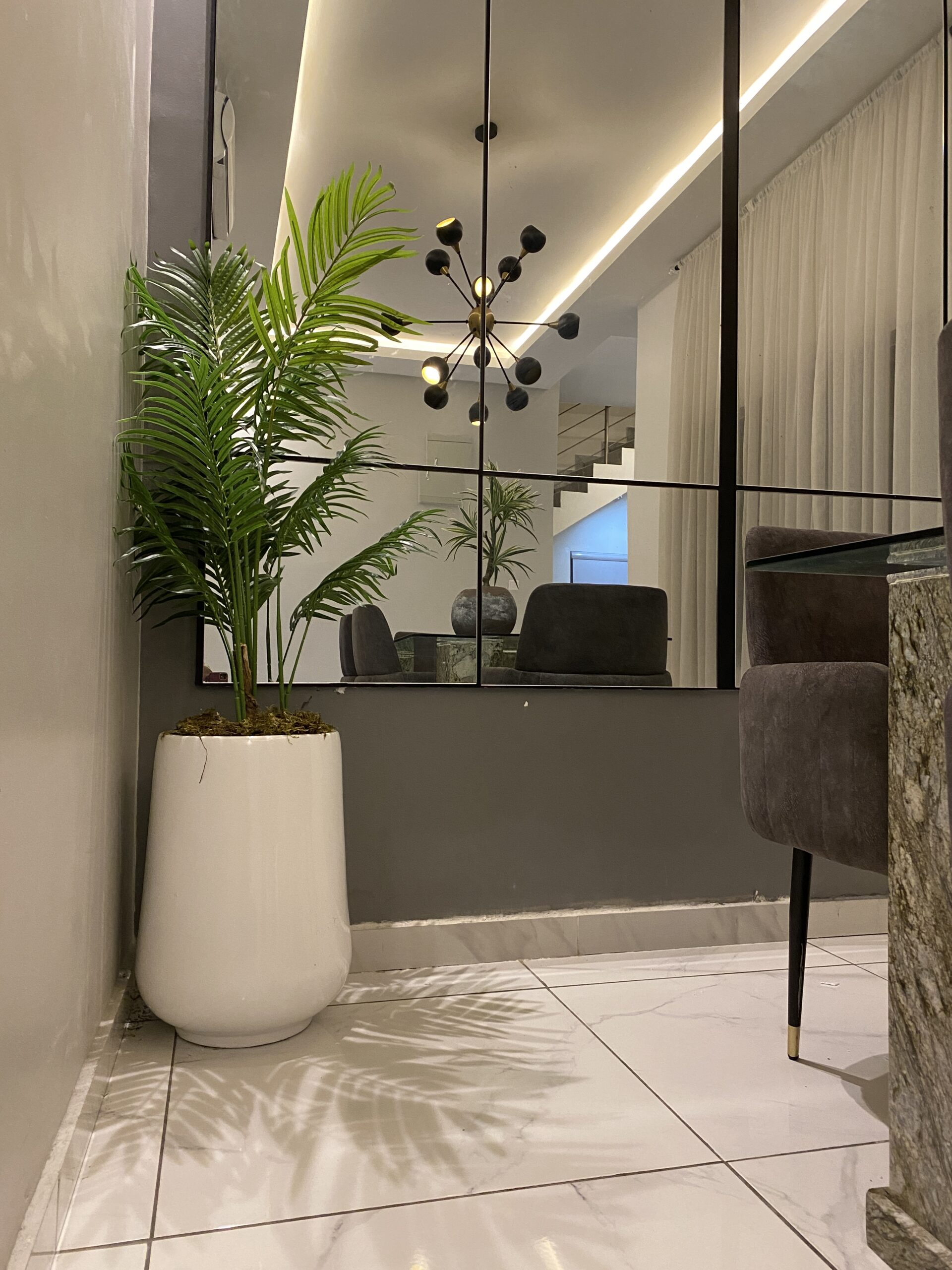 Artificial Bird Palm with Honey Pot trees in hallway
