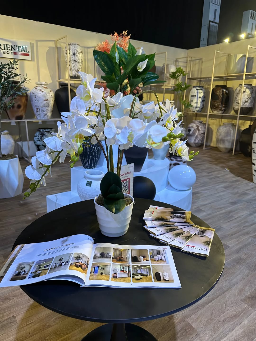  Oriental Effect booth at Design Week Lagos 2025 featuring planters, artificial trees, and décor accents)