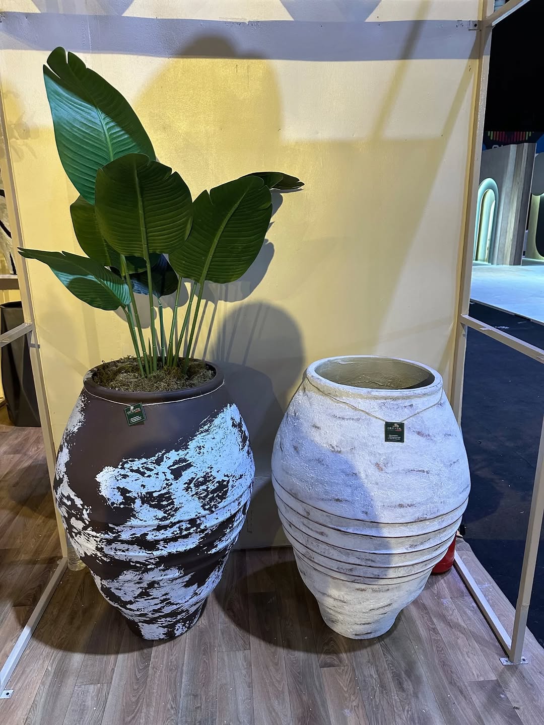 Oriental Effect booth at Design Week Lagos 2025 showcasing nature-inspired décor, planters, and artificial plants