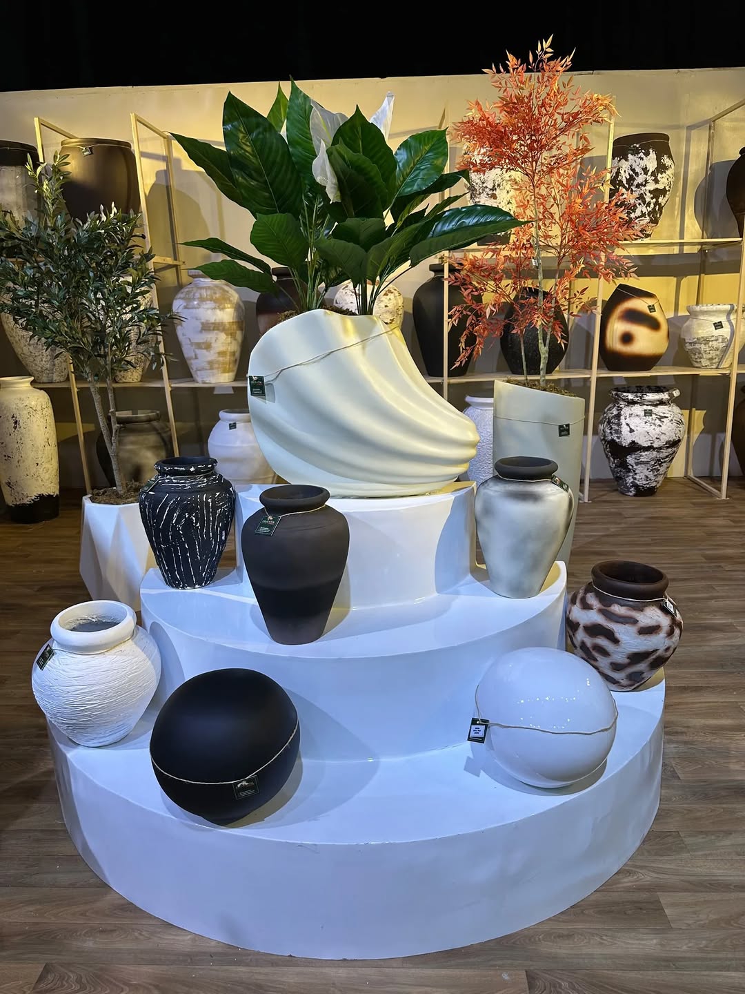 Oriental Effect booth at Design Week Lagos 2025 featuring planters, artificial trees, and décor accents)