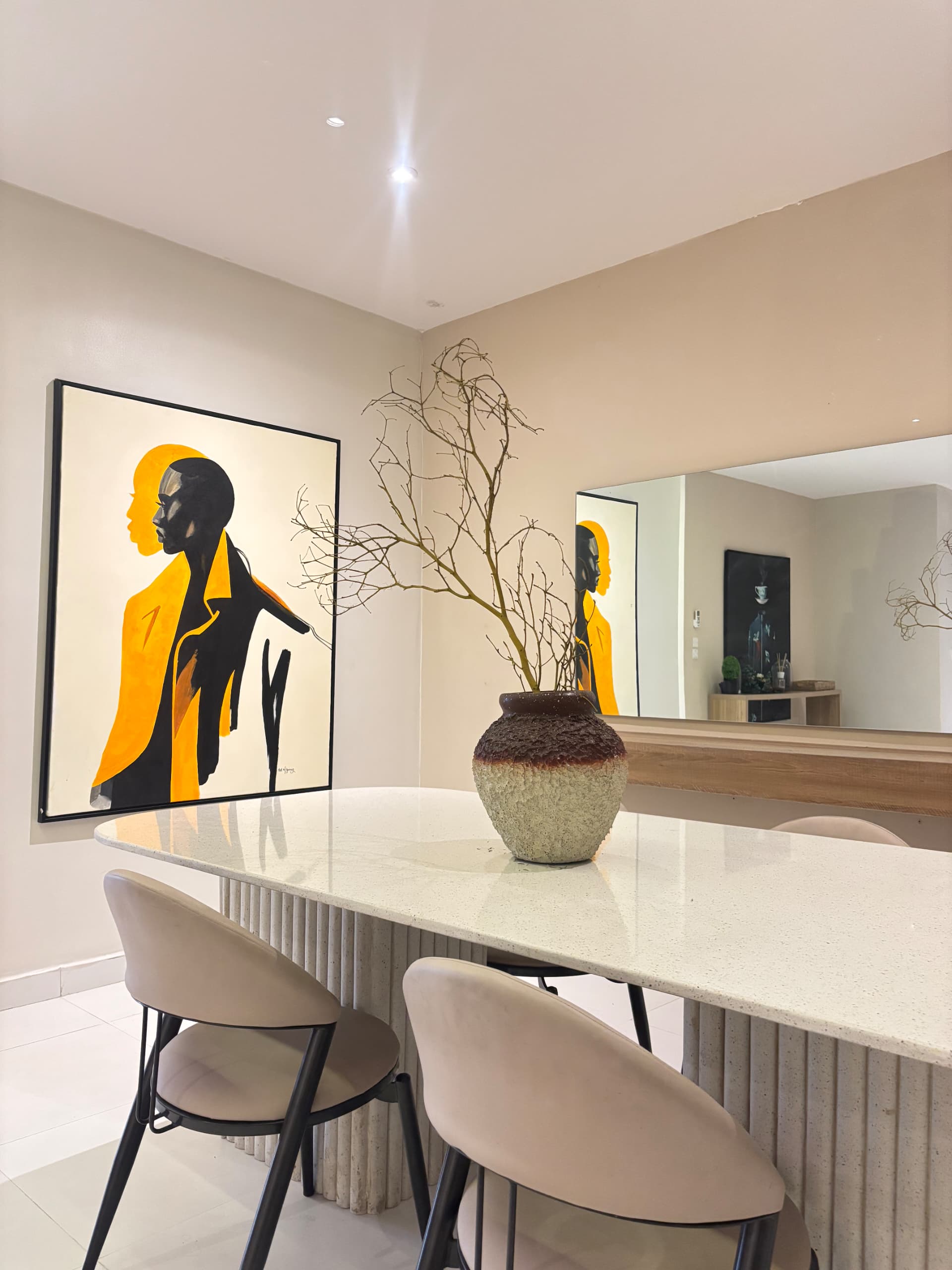 Elegant ombre sandblast vase styled as a table centerpiece, bringing warmth and style to dining and coffee tables. Oriental Effect Nigeria.