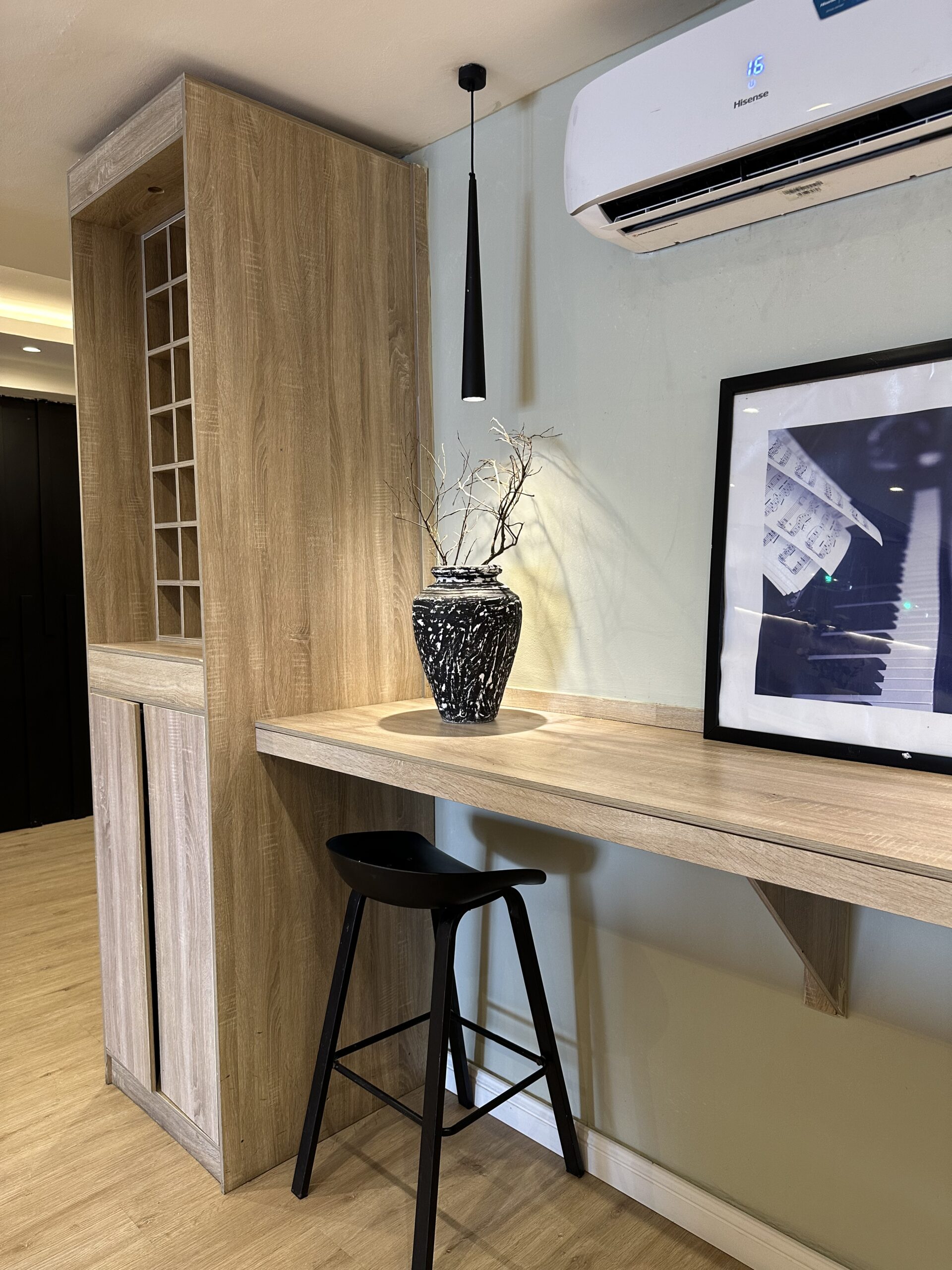 Natural twigs beautifully arranged in the Patched White Rustic Vick Vase, one of our elegant flower pots — Oriental Effect Nigeria.