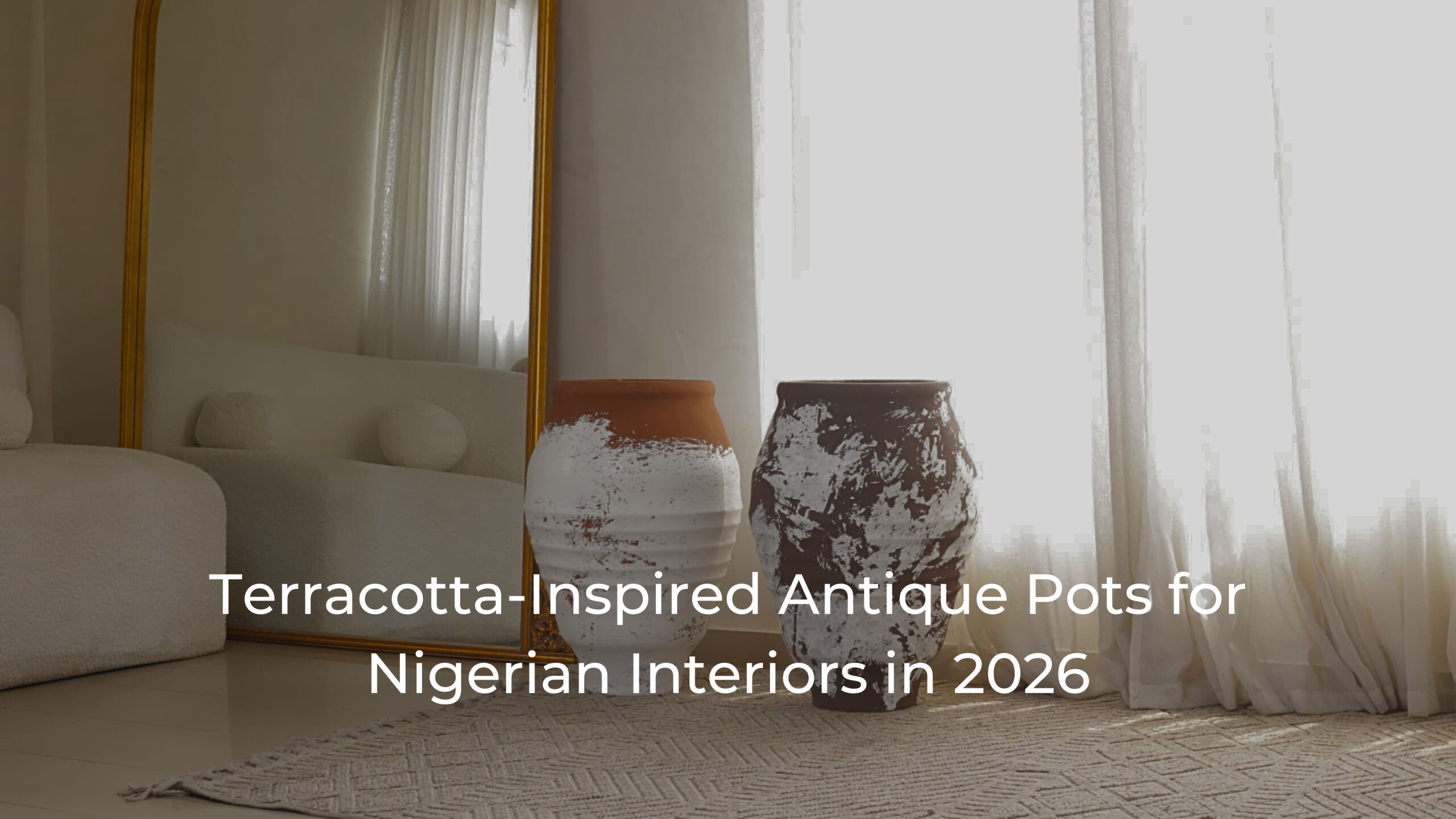 Terracotta-inspired antique pots in warm earthy tones placed beside a floor mirror in a sunlit Nigerian interior, showcasing textured finishes and Afrohemian-style decor for 2026.