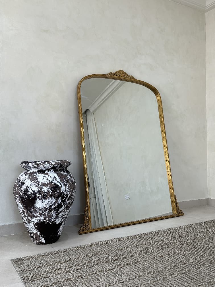 rustic terracotta antique pots with aged textures for Afrohemian Nigerian interiors