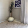 Modern Artificial Slim Yucca Plant with textured pale shoe planter for home and office interiors