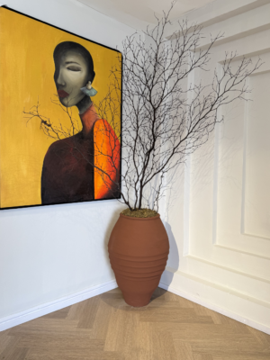 Decorative twigs in Nigeria styled in Terra Big Venice Antique Planter