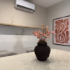 Decorative Vase with Artificial Plant in Nigeria Modern home décor with decorative vase and greenery
