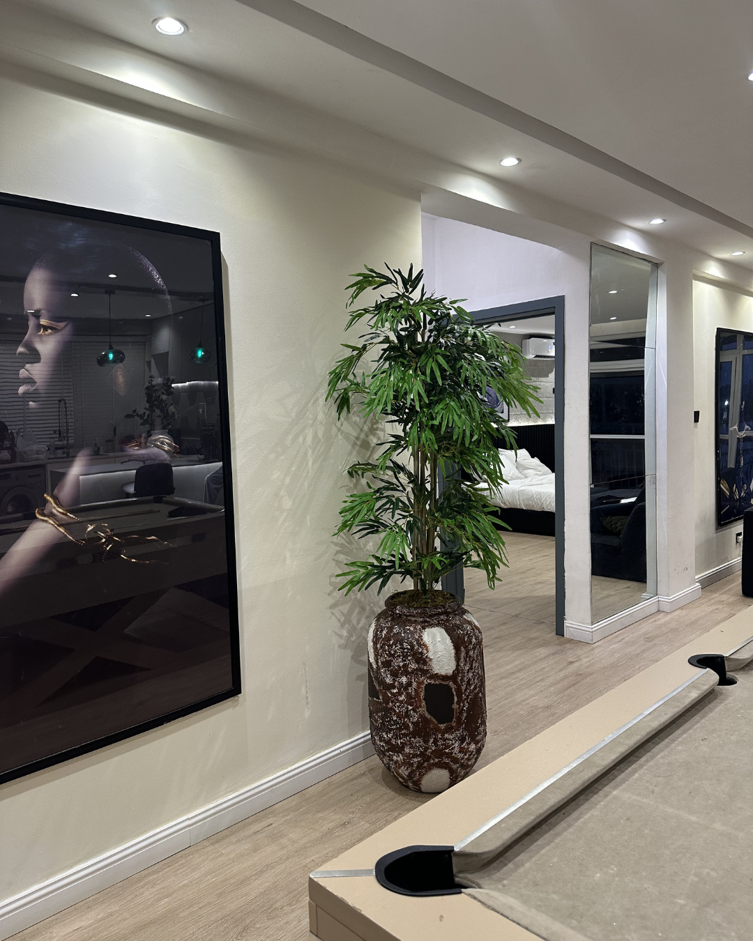 Plant Shop Near Me – Artificial bamboo tree in a warm brown planter for elegant home and office décor.