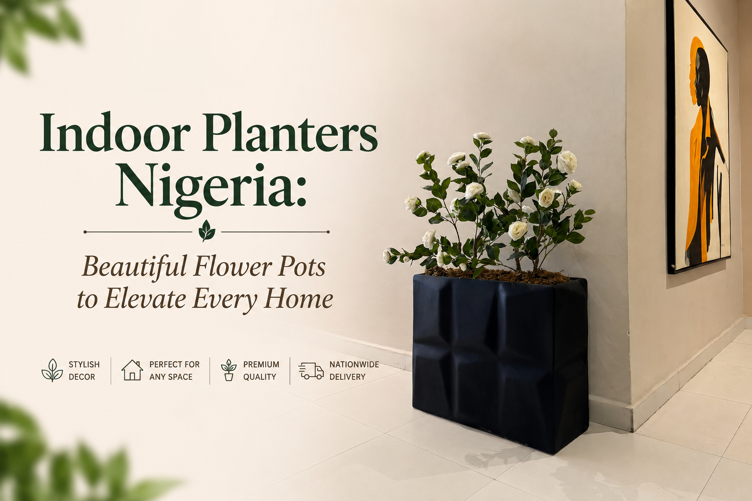 Indoor planters in a matte black geometric planter styled with white artificial camellia flowers to elevate a modern Nigerian home interior.