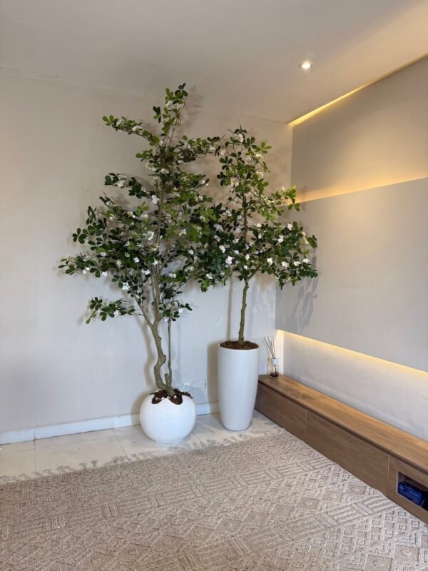 Glossy White Wobble and Nude Medium Cylinder Pots Styled with 250cm and 185cm Artificial White Exotica Tree