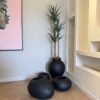 Matte Black Ampora Pot Paired with Granite Small and Flat Orbis Pots, Styled with Artificial Slim Yucca Tree Matte Black Ampora Pot Paired with Granite Small and Flat Orbis Pots, Styled with Artificial Slim Yucca Tree, view 2