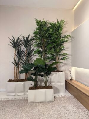 Neutral Prism Pot Cluster Styled with Artificial Slim Yucca, Fan Palm and Bamboo Trees Neutral Prism Pot Cluster Styled with Artificial Slim Yucca, Fan Palm and Bamboo Trees