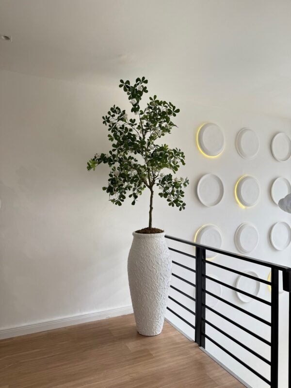 Textured White Nile Pot with Artificial White Exotica Textured White Nile Pot with Artificial White Exotica