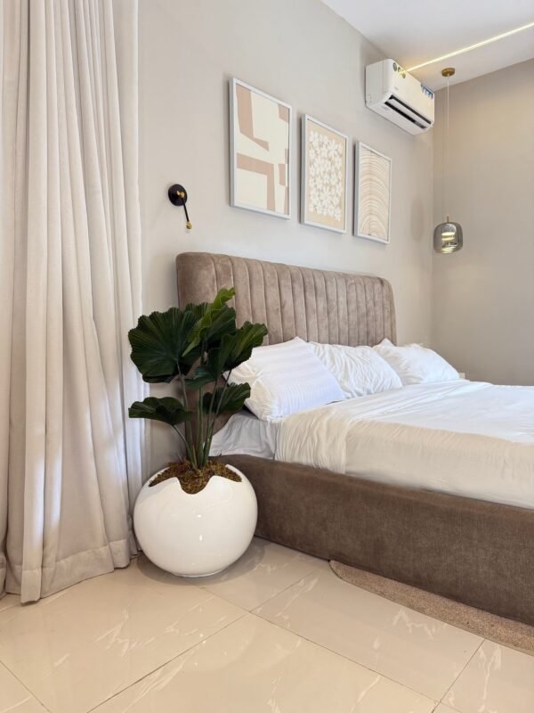 White Wobble Pot with Artificial Fan Palm